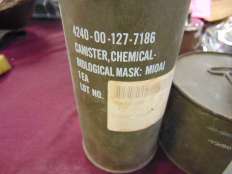 4 masks: M10A1, C2, & two C2A1 (unopened)