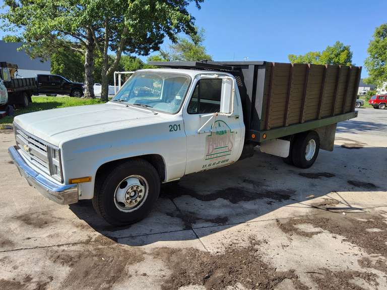 1978 Chevy 1 ton, 5.0 V8, auto trans, Showing 92980 miles, pwr steer/ pwr brakes, crank windows, 2 fuel tanks, Vin#: KS128089, pwr dump bed approx 12.5ft long, no Air, (Starts & Runs) -- Truck #201