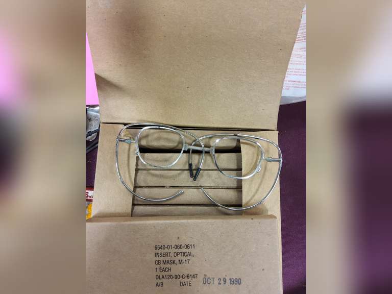 Group: gas masks, filters, US Army patch, NIP Baby Scape Hood, Case of Optical Inserts for M17 CB masks, & other