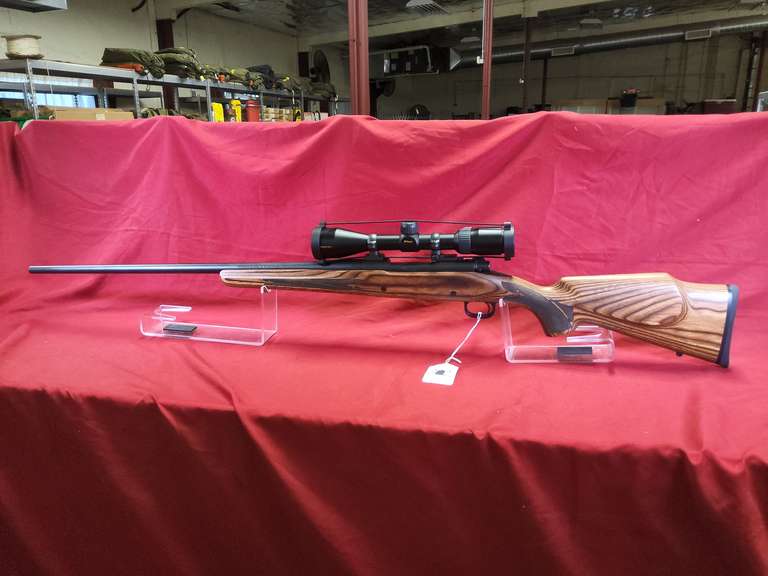 Winchester Mod: 70, 300 win mag, bolt rifle, Nikon Pro Staff 3-9x40 scope, laminate fajen stock, Ser#: G2306806, soft case 98%