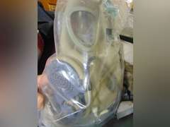 4 various gas masks in bags (unknown)