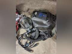 Some type of scuba diving gear, a protective suit & Aluminized fire proximity suit (boots, gloves, pants, jacket, & hood)