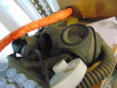 Group misc: various gas masks, measuring tape reel, filters & other items SEE PICS