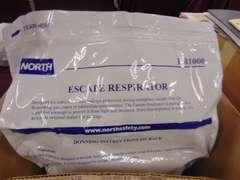 2 NEW North ER1000 escape respirators