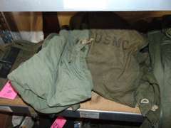 Group: Military winter coat & pants, frame/harness for a AN/PRC-77 portable radio, & other SEE PICS