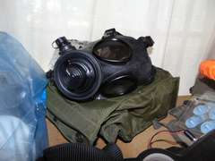 Group misc: various gas masks, measuring tape reel, filters & other items SEE PICS
