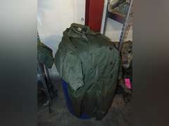 Group: Military winter coat & pants, frame/harness for a AN/PRC-77 portable radio, & other SEE PICS