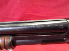 Winchester Mod: 12, 12ga pump shotgun, 28" solid rib brl, 2-3/4", modified, mfg. 1936, Ser#: 709182, 96%
