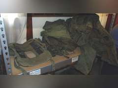 Group: Military winter coat & pants, frame/harness for a AN/PRC-77 portable radio, & other SEE PICS