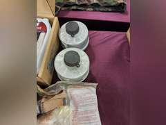 Group: gas masks, filters, US Army patch, NIP Baby Scape Hood, Case of Optical Inserts for M17 CB masks, & other