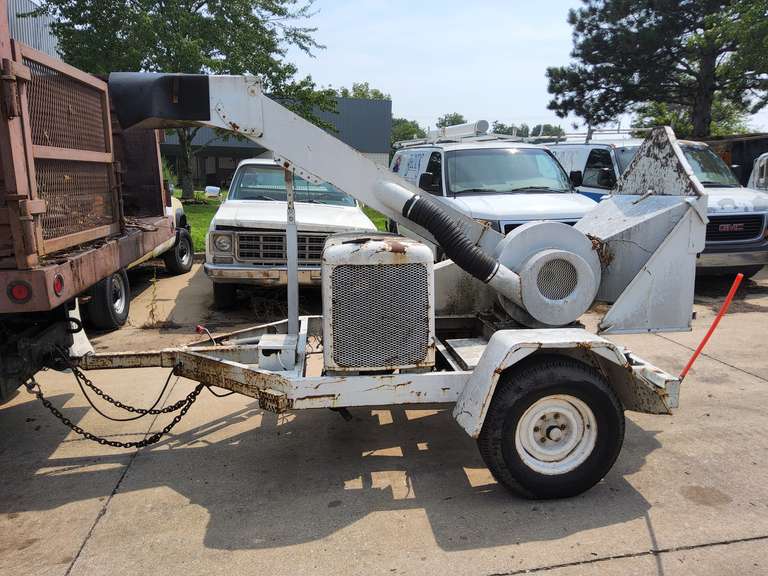 Trailer mount chipper shredder, pintle hitch, showing approx 99217 hours, Runs