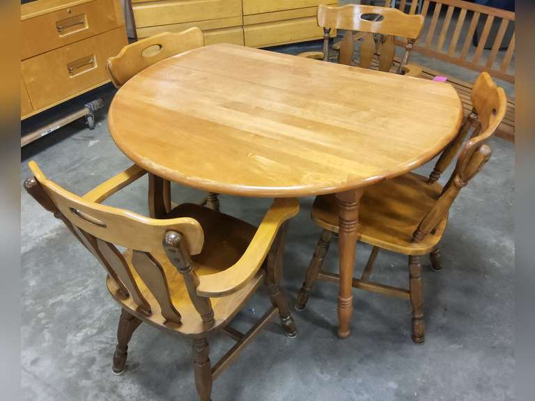 Wood dining table with 2 drop leafs, extra leaf & 4 chairs