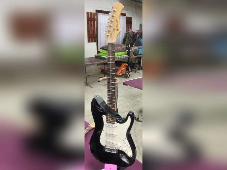Baltimore electric guitar (missing 3 strings) with stand
