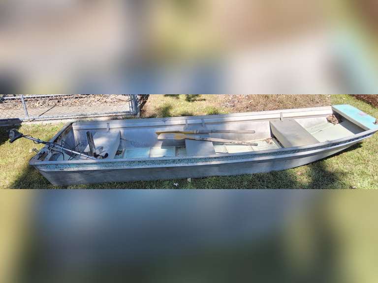 Approx 12ft long metal boat with oars (oars may need repair) & trolling motor