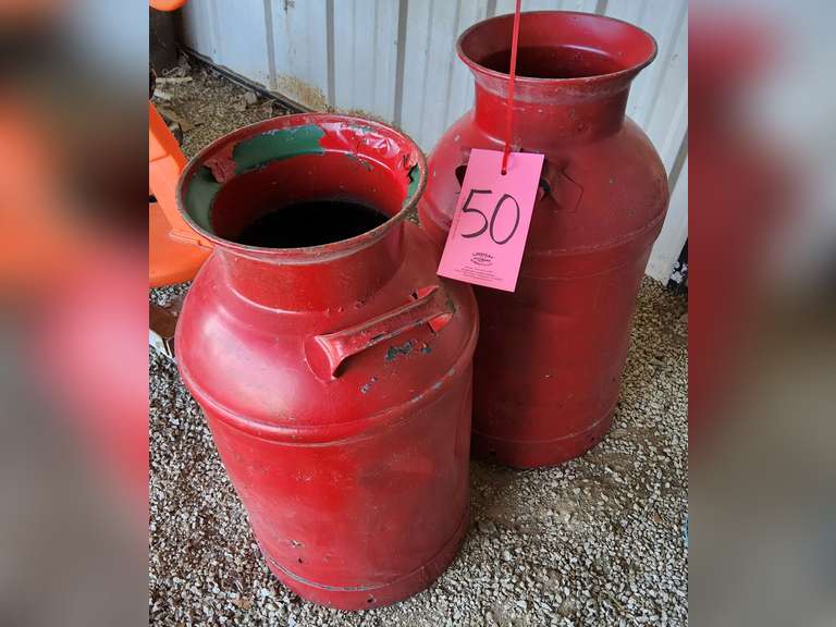 2 metal milk cans