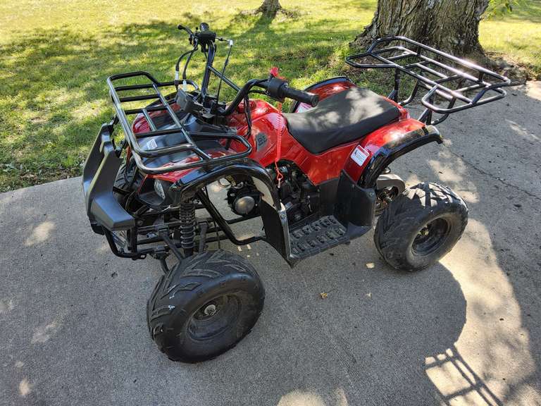 Kids 4 wheeler (currently not running, may be bad gas) 2 helmets, goggles