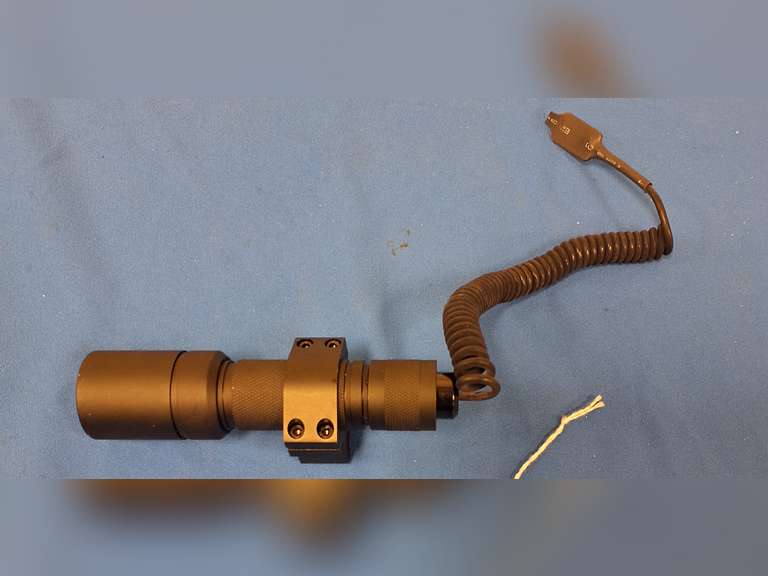 Front mount tactical light