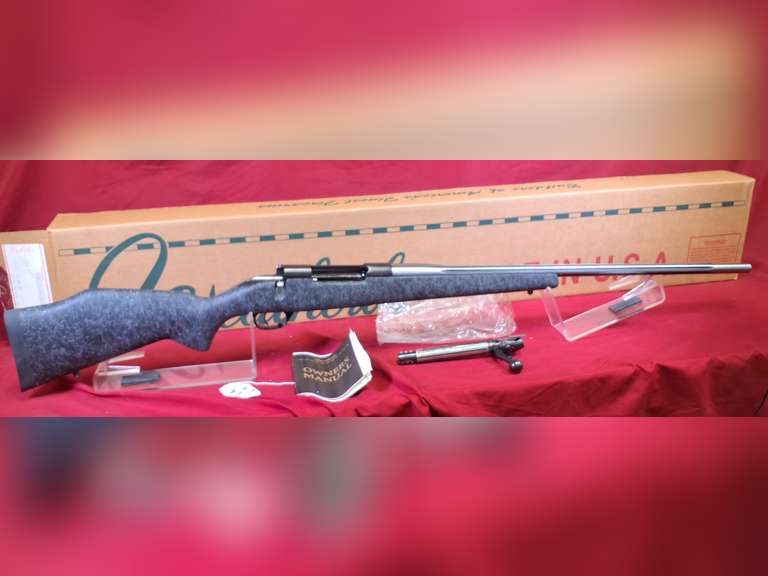 Weatherby Mod: Mark V, 257 WBY Mag, bolt rifle, Ser#: S8030793 , 26" stainless fluted brl, gray syn stock, box, 98%