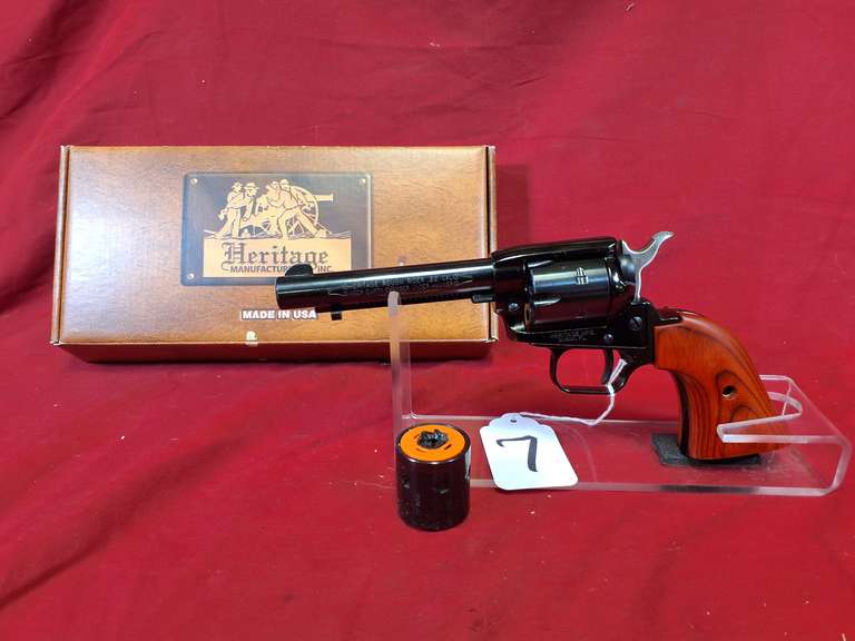Heritage Mod: Rough Rider, 22LR & 22mag revolver, Ser#: V22682 , 4-7/8" brl, wood grips with mag cyl, box, book, 98%