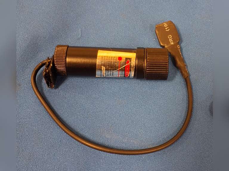 Front mount laser