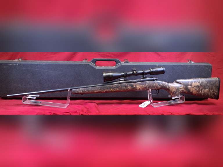 Winchester Mod: 70 XTR Sporter Magnum, 300 win mag cal, bolt rifle, Ser#: G1793905 , bushnell elite 3200 scope, camo stock, blued, with hard case, 98%