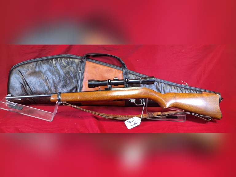 Ruger Mod: 10/22 carbine, 22LR cal semi auto rifle, Ser#: 1202, pre-warning, factory wood stock, leather sling, Weaver K4-F scope, 1 mag, soft case, believed to be 1965, 96%