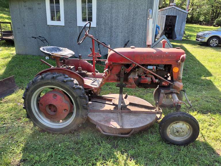 Farm All Cub tractor (approx a 1949-1950 model), 20HP, 6 volt, comes with mower 48", blade 54"& plow (RUNS/DRIVES)