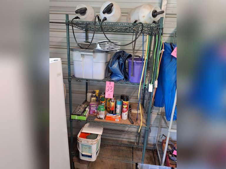Shelf WITH contents: pest sprays (level unknown), bungees, tarp, pump sprayers & other misc SEE PICS