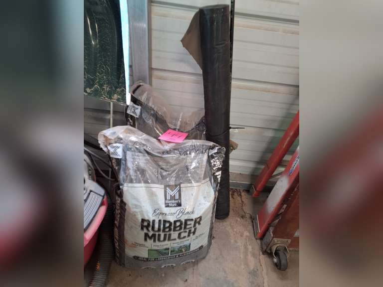 2 bags of black rubber mulch, partial roll of weed barrier & other