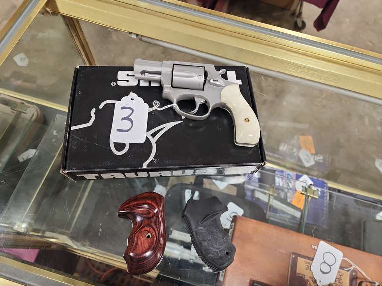 Taurus Mod: M605, 357 mag revolver, Ser#:JM19845, 2" brl, in box, book, (believe to be new), 98% w/ 2 extra grips
