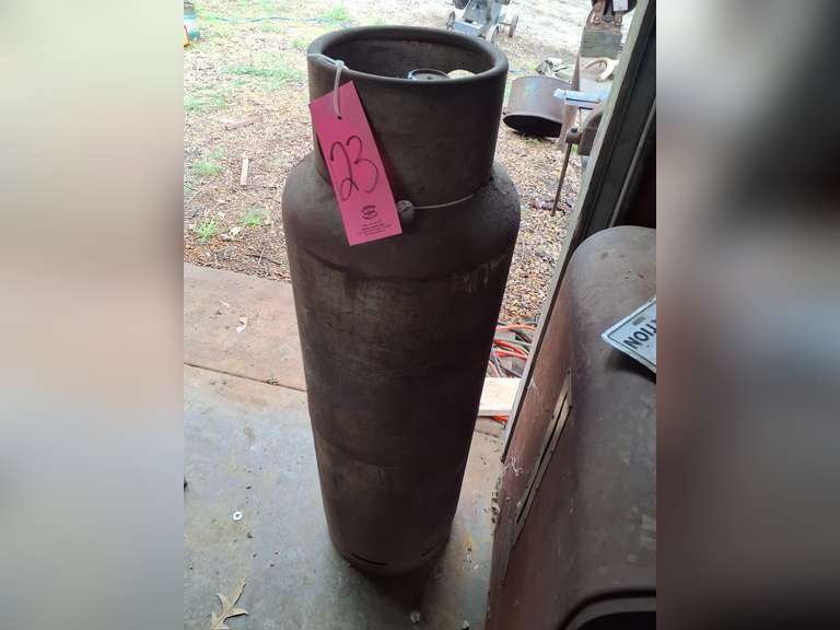 Propane tank (level unknown) approx 49" tall