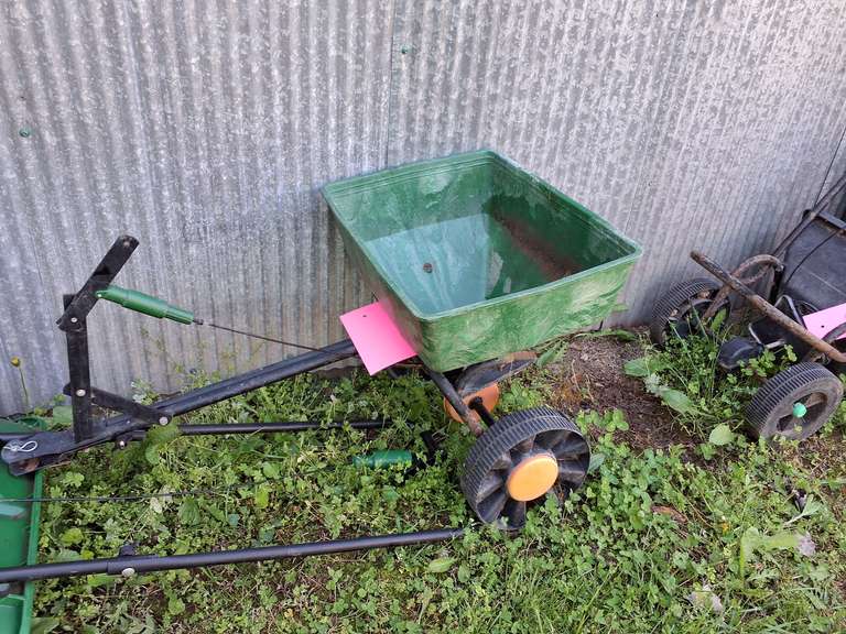 Pull behind lawn seeder/spreader