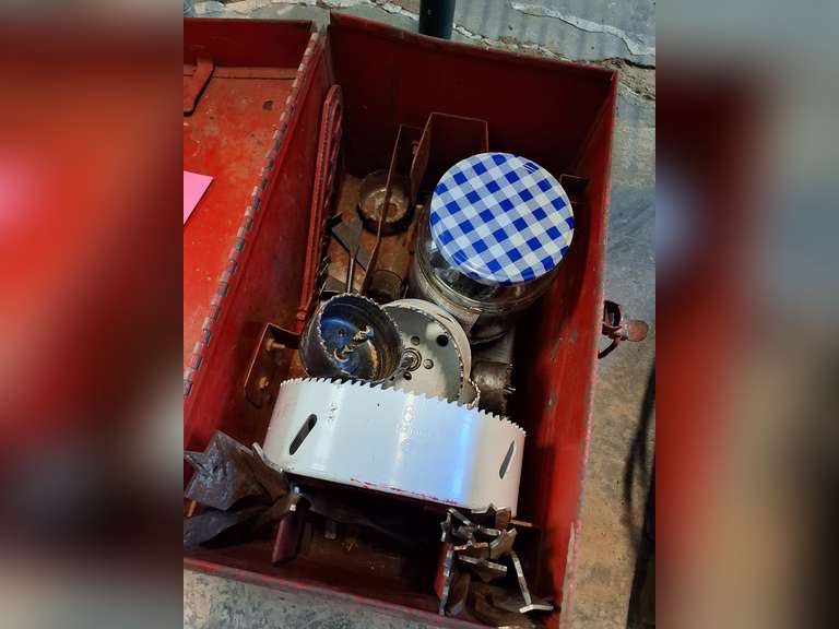 Metal tool box with hole saws, boring bits & other