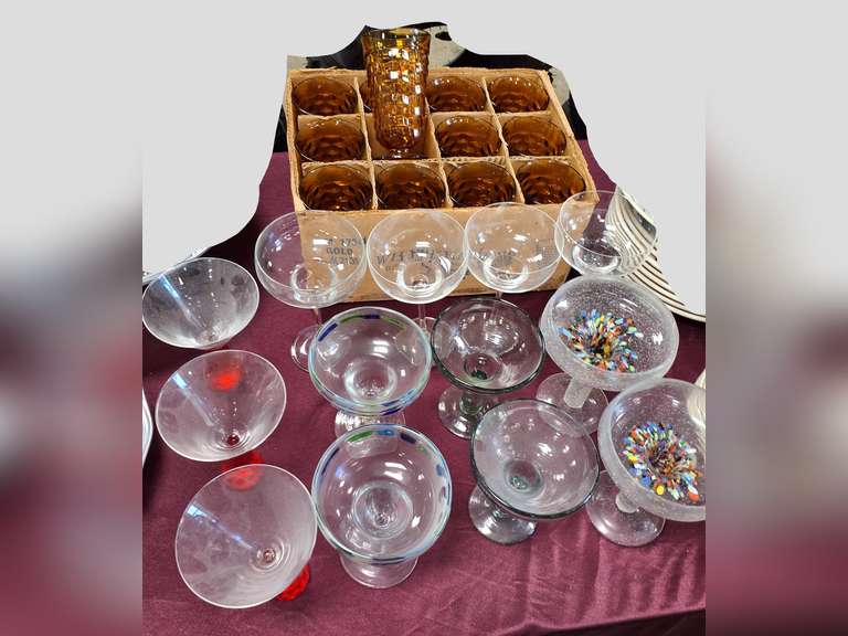 Group of margarita glasses & amber colored glasses