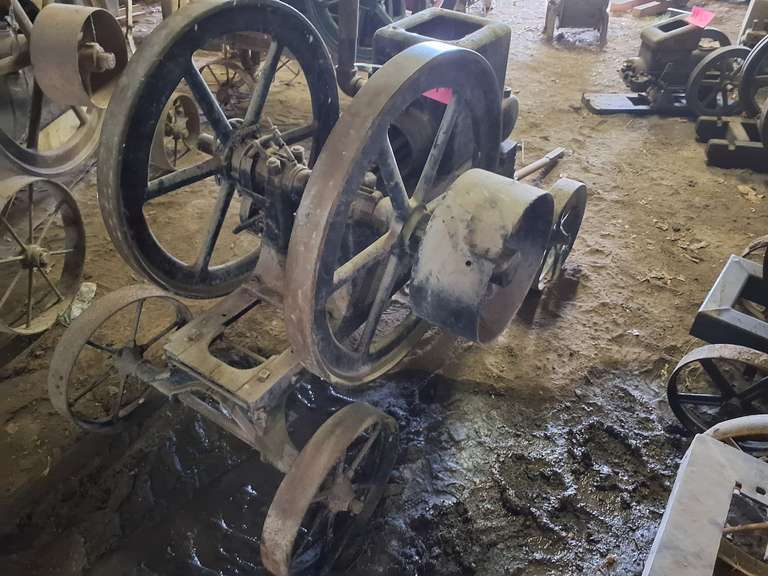 Witte 6HP hit miss engine #45597, approx 32" fly wheels mounted on 4 wheel trolley cart
