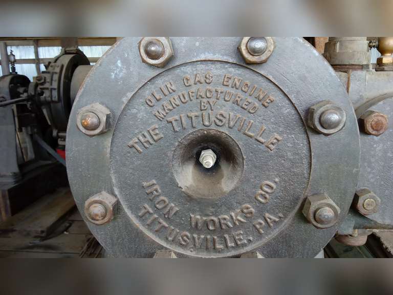 Olin gas hit/miss Engine Mfg Titusville Iron Works Co. Titusville P.a. serial #4398 25 h.p. Olin Engin 63" fly wheels mounted on triple axle homemade trailer, walnut floor, 14.5 tires will need air for tires and possibly new tires, been sitting for approx 10 years, 4 stabilizer jacks, 2 5/16 hitch, NO TITLE, shipped to Tulsa Oklahoma to Welda Kansas, used from 1920's to after WW2. (at different location, in Ozawki Ks. Call Tom Lindsay @913-238-2473 to set up a time to preview.(SELLS SUBJECT TO OWNERS APPROVAL)