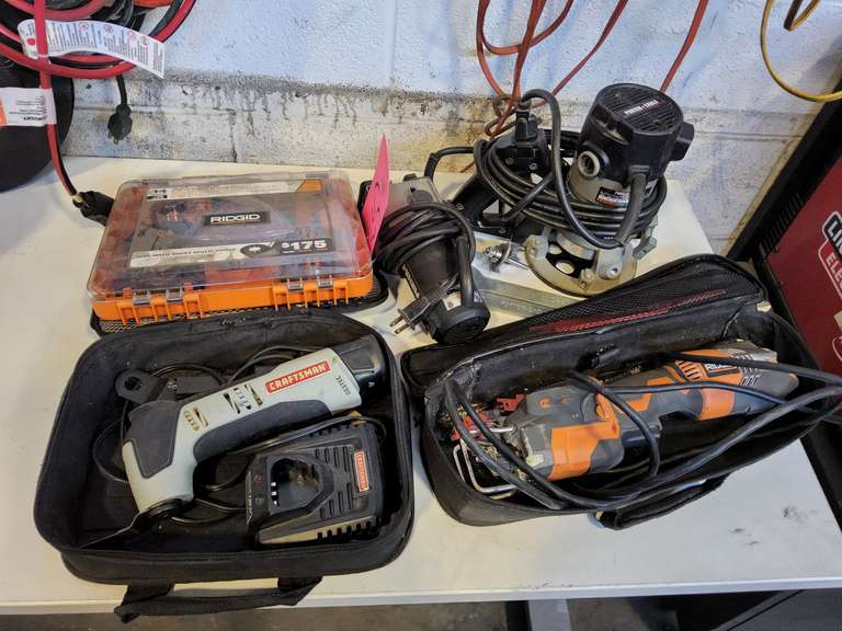 4 Electric power tools, ridgid R3031 reciprocating saw, Porter cable mod 691 router, Craftsman 12v cordless multitool w/1 battery & charger, porter cable 7318 tilt laminate, Ridgid 14 pc multitool blade kit w/sanding sheets