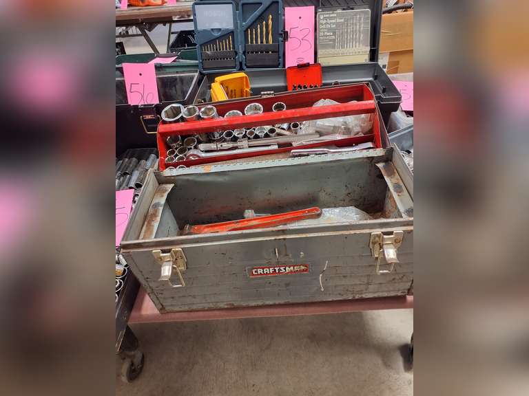 Metal tool box with various sockets, ratchets, pipe wrneches & other