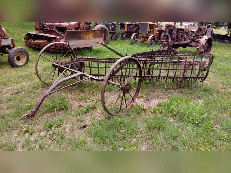 Steel wheel pull hay rake