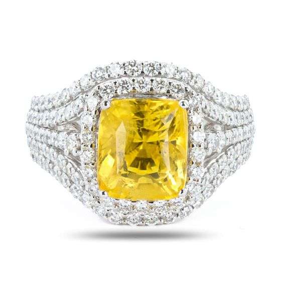 RING CENTER UNHEATED YELLOW SAPPHIRE 5.10ct. ( GIA CERTIFIED) DIAMONDS 1.32ct.tw. PLATINUM