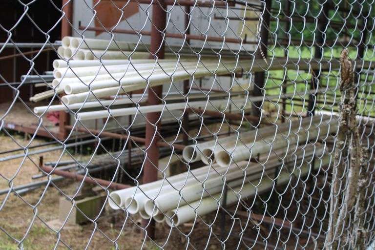 ALL PIPE ON RACKS LOCATED BEHIND BUILDING OUTSIDE