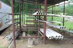 ALL PIPE ON RACKS LOCATED BEHIND BUILDING OUTSIDE