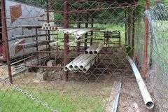 ALL PIPE ON RACKS LOCATED BEHIND BUILDING OUTSIDE