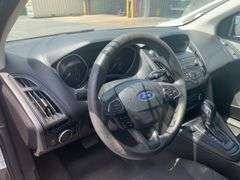 2018  FORD  Focus  1FADP3F22JL255522  Mileage:   119206