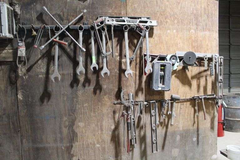 MISC. TOOLS ON WALLS AND BENCH AS PHOTOGRAPHED