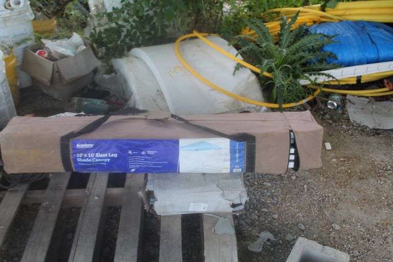 LOUNGE CHAIRS, SHADE CANOPY; YELLOW GAS PVC PIPE