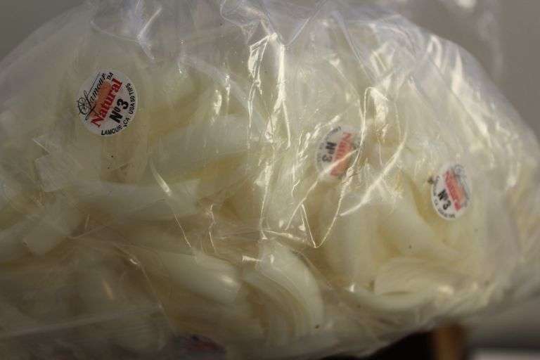 LOT OF LAMOUR NATURAL NAIL TIPS IN ASSORTED SIZES FROM 0-10, WITH STORAGE CONTAINER