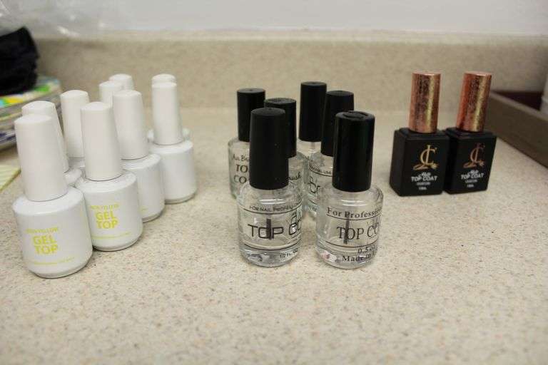 VARIOUS BOTTLES OF TOP COAT