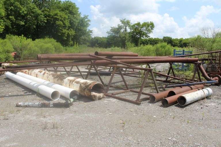 2- PIPE RACK WITH CONTENTS IN BACK LEFT OF YARD