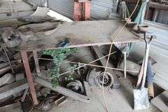 METAL TABLE WITH VISE AND SCRAP METAL (TABLE 5'6"x2'9")